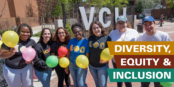 A group of students holding balloons in front of the large meal VCU letter with the text diversity, equity and inclusion