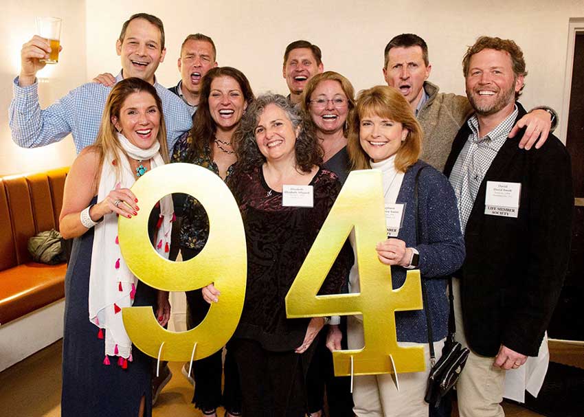 A group of people pose for a photo.