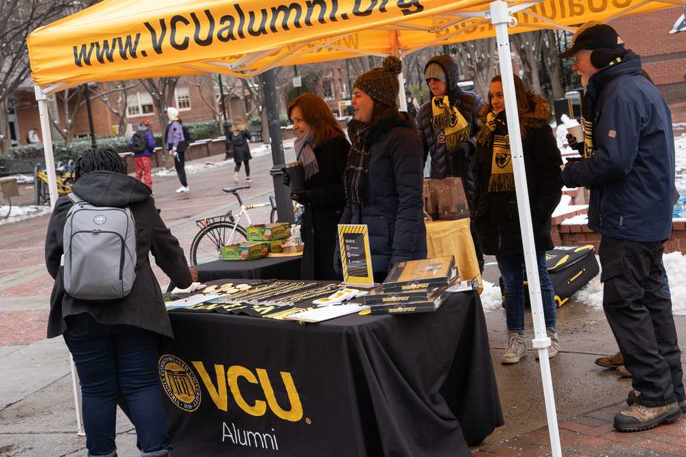 V-C-U staff welcome students back to campus on the first day of the spring 2019 semester.